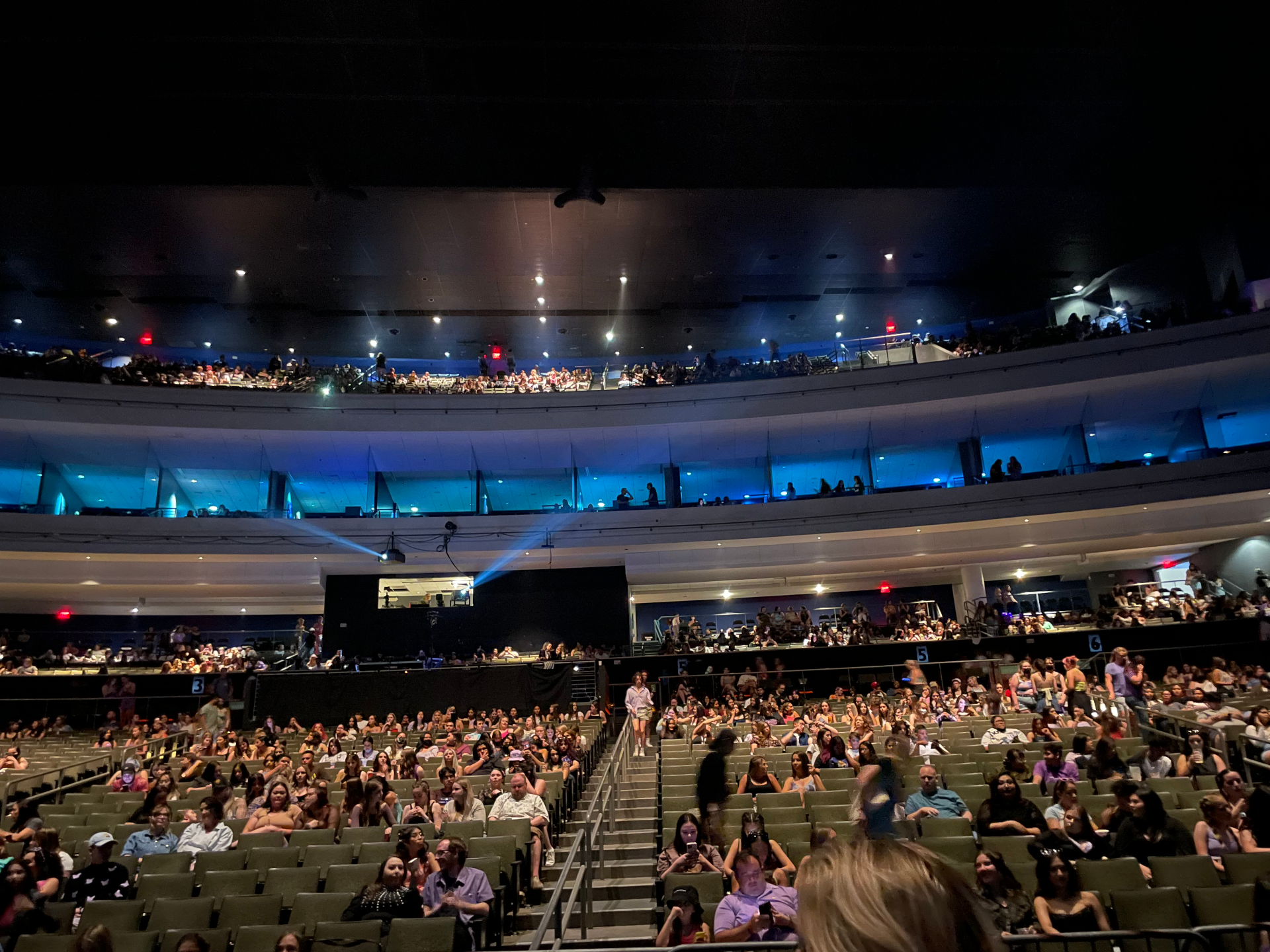 A packed arena audience waiting for the keynote
